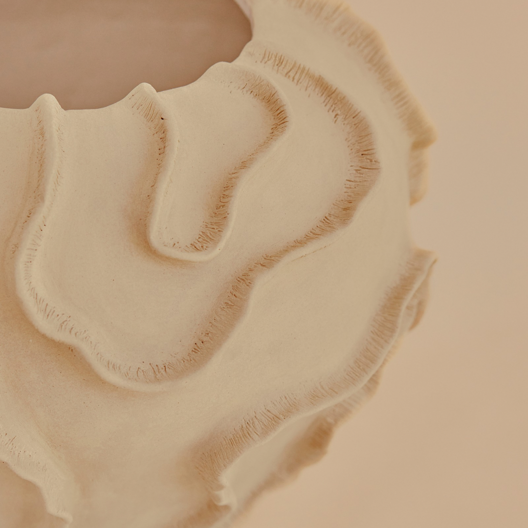 CORAL SCULPTURAL VASE