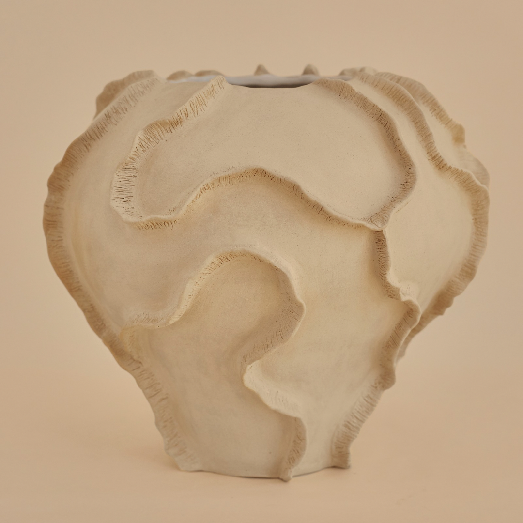 CORAL SCULPTURAL VASE